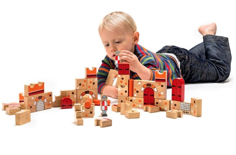 boy playing wooden games